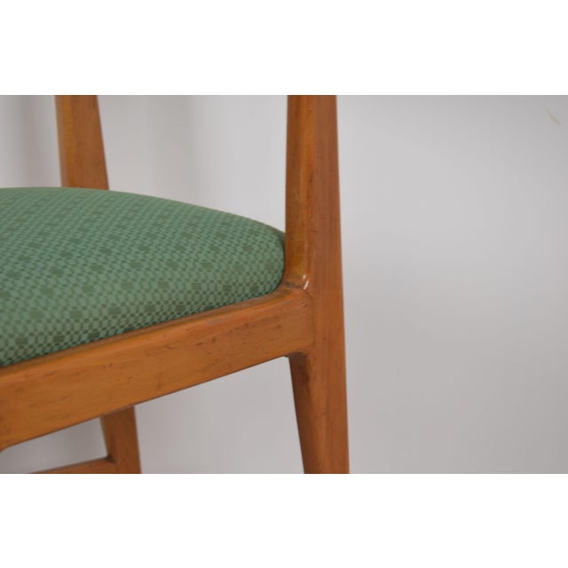 This elegant set of four Italian chairs dating back to the 1950s is a quintessential example of postwar home furnishings,...