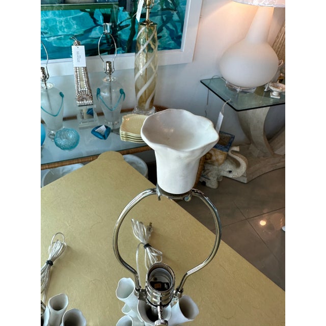 Vintage pair of amazing porcelain faux coral tubes table lamps. Newly wired with clear cord, all new nickel hardware with...