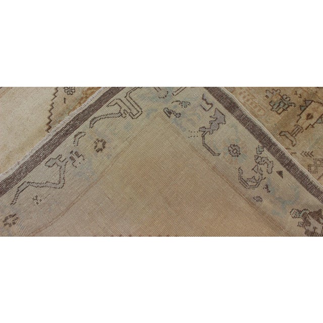 Mid 20th Century Vintage Turkish Oushak Rug Featuring Faded Camel, Ivory, and Pale Blue Accents For Sale - Image 5 of 6