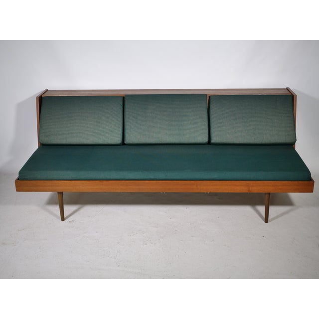 Beautiful daybed from the 60s. The backrest can be raised to create a lying surface. Width: 193cm Depth: 90cm Height: 72cm...