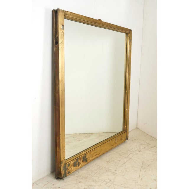 Made from muntz metal like brass, these window frames were reclaimed from the famous International Toy Center in New York...