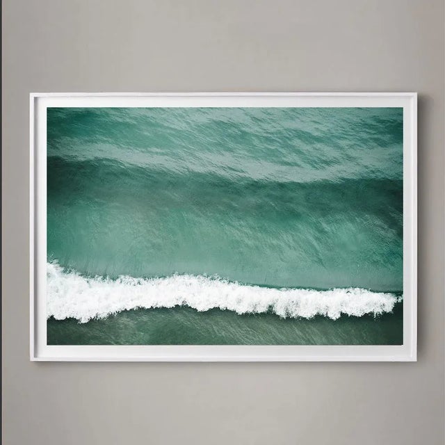 A large 48" X 32" photographic print overlooking a dramatic cresting wave in the Pacific Ocean. Minimal but epic. Unframed...