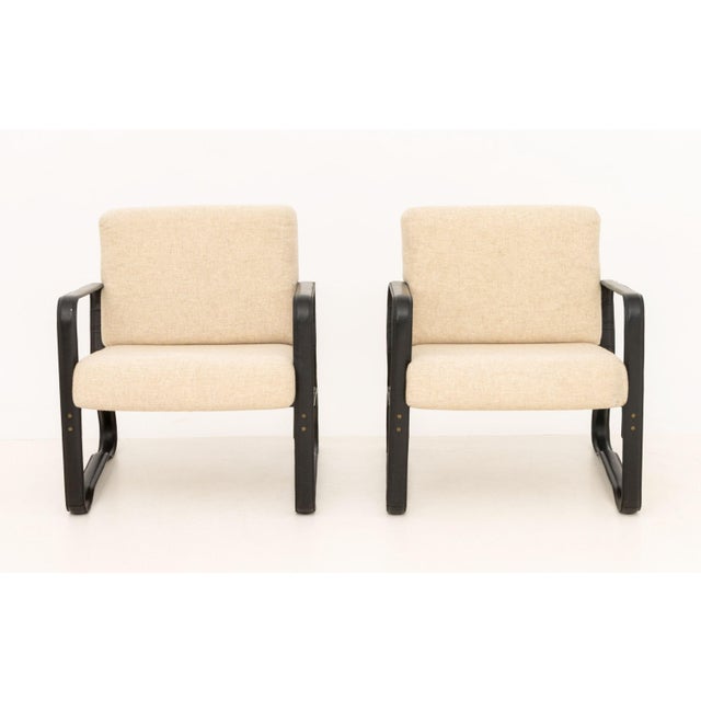 Pair of Ralph Lauren "Cliff House" Black Leather Wrapped Lounge Chair, with beige wool upholstered seats and backs,...