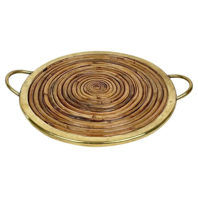 Round serving tray in bamboo and brass details. Made in Italy in the 1970s.