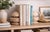A striking pair of vintage travertine sculptural bookends featuring a bold layered architectural form carved from solid...