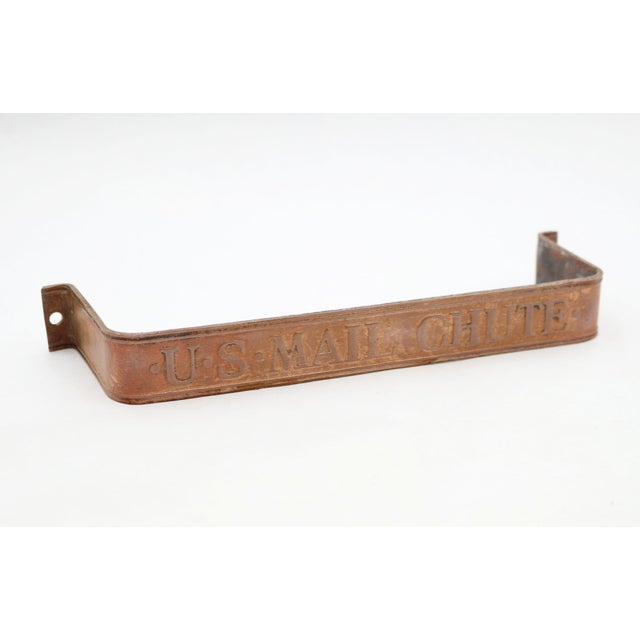 This brass handle was used to secure the vertical glass fronts of the gravity US mail chutes on the walls of early hotels...