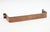 This brass handle was used to secure the vertical glass fronts of the gravity US mail chutes on the walls of early hotels...