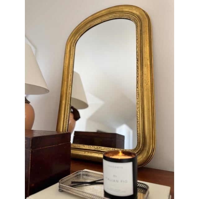 About Elevate your space with this stunning gilt wood arched mirror, similar to the timeless elegance of Louis Philippe...