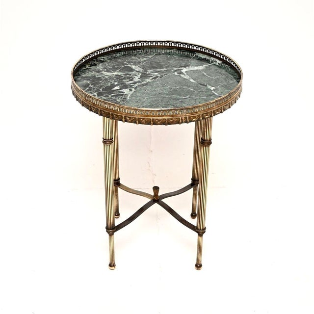 A stylish and very well made vintage French brass and marble occasional side table. This was made in France, it dates from...