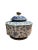 Maitland-Smith blue and white octagonal lidded jar featuring a delicate brass fish. This elegant jar features lovely blue...