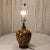 Vintage MCM Wood Lamp With Black Base Color and Embellished With Light Tan Circles With a Touch of Red Grain lines. No...