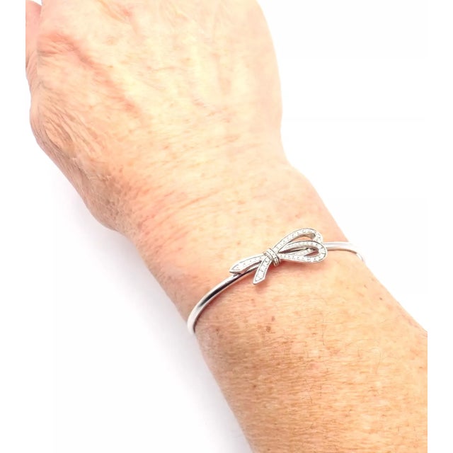 Metal Late 20th Century Tiffany & Co. White Gold Diamond Bow Ribbon Bangle Cuff Bracelet For Sale - Image 7 of 10