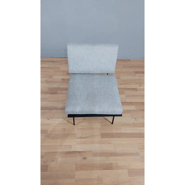 Florence Knoll model armchair 31, made in the 1950s for Knoll International. Black lacquered metal structure in its...