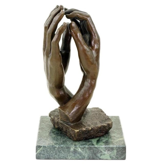 20th century modern brown patinated bronze sculpture. Inspired by Auguste Rodin, this work reflects his interest in...