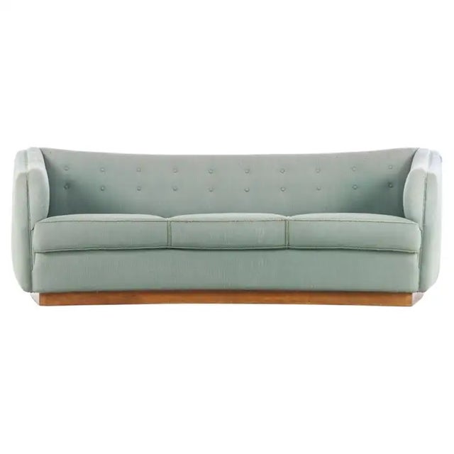 Superb and rare sofa designed by Ole Wanscher and produced by Fritz Hansen as model 1668 probably in the 1940s. The model...