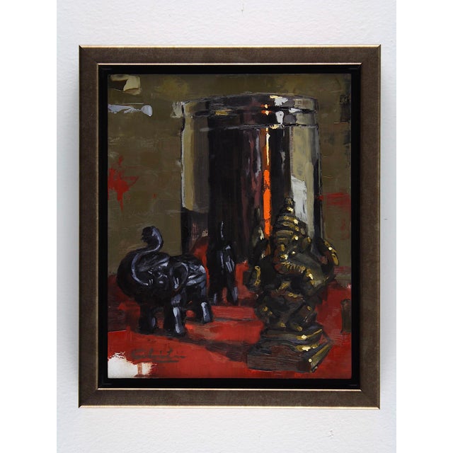 This artwork features a striking arrangement of symbolic figures, including a black elephant and a golden Ganesh, set...