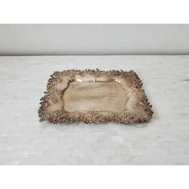 An exquisite antique decorative sterling silver tray with heavy repose flower and leaf pierced openwork motif by Redlich &...