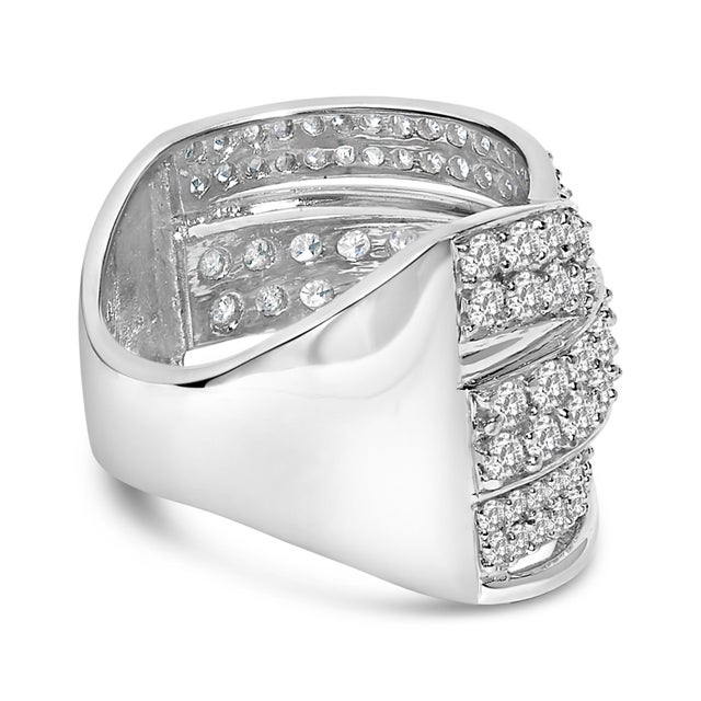Bold and striking, this glamorous diamond band is crafted from genuine .925 sterling silver, a metal that will stay...