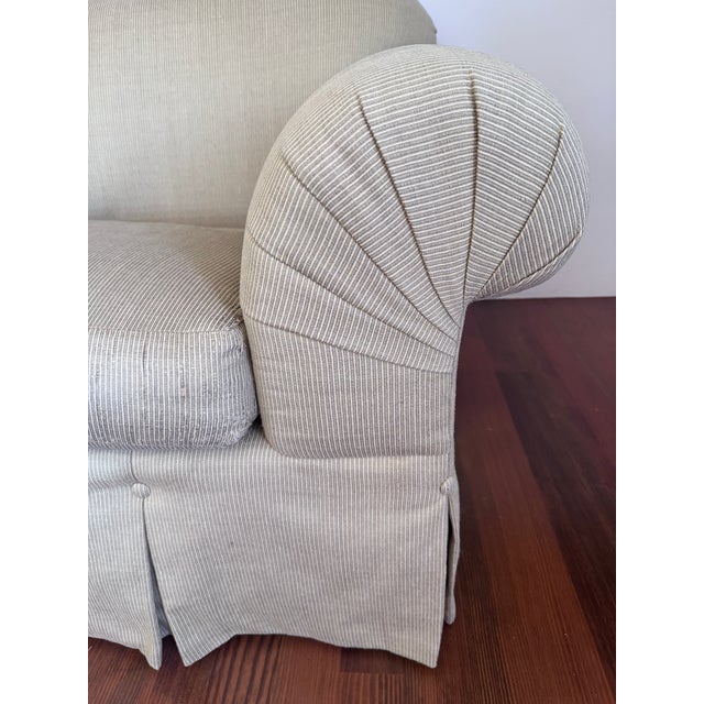 A Rudin Sofa - Style Number 2499 The sofa measures 84" long/36" deep with a back height of 32.5", seat height of 18" and...
