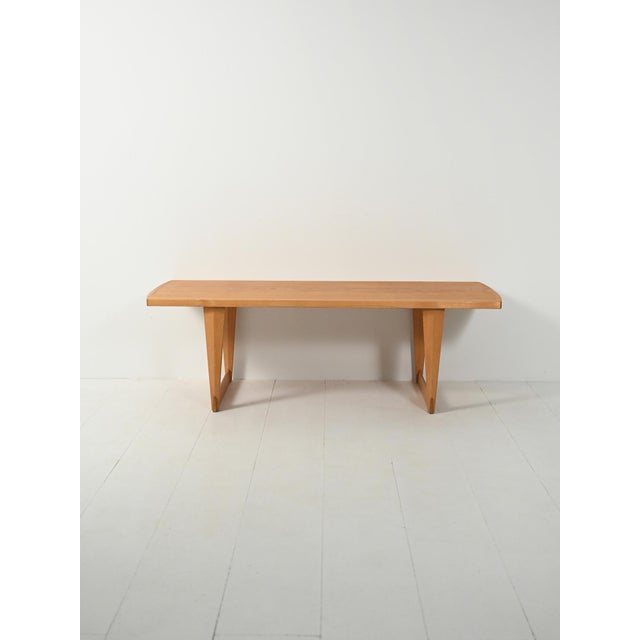 Scandinavian oak coffee table for ab säffle möbelfabrik: triangular frame legs, chamfered edges and profiles, balanced...