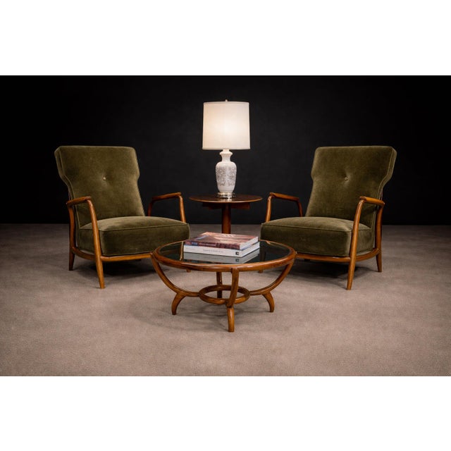 Executed in pau marfim (ivory-toned Brazilian hardwood), this pair of armchairs by Giuseppe Scapinelli embodies the...