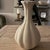 Crate & Barrel Gourdgeous Small Earthenware Vase featuring an organic sculptural silhouette inspired by natural gourd...