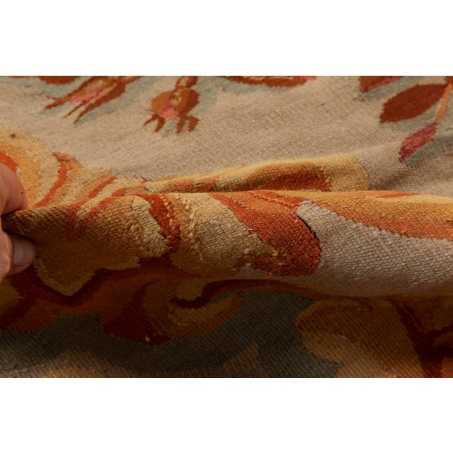 This breathtaking mid-19th-century Aubusson rug epitomizes the opulence and refinement of French decorative arts during...