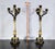 Beautiful pair of double -patina bronze candlesticks, brunette and gold, with four lights. Overlooked by a central candle...