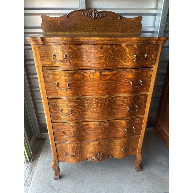 Stunning antique serpentine tall-boy dresser. Gorgeous quarter sawn wood grain in warm, rich tones and fabulous patina....