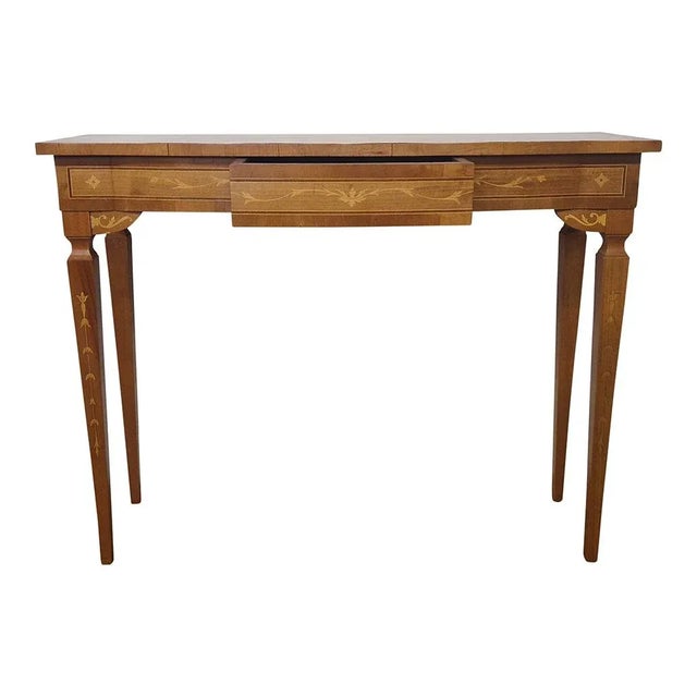 Console with wavy front in Louis XVI style, in walnut wood with inlays; a central drawer. Dimensions (WxDxH) 101 x 36.5 x...