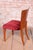 This magnificent and characteristically shaped set of twelve Art Deco chairs, dating from the 1940s in Czechoslovakia,...