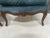Pair of louis xv style bergère armchairs in natural wood stained beechwood frame carved with shell and floral motifs blue...