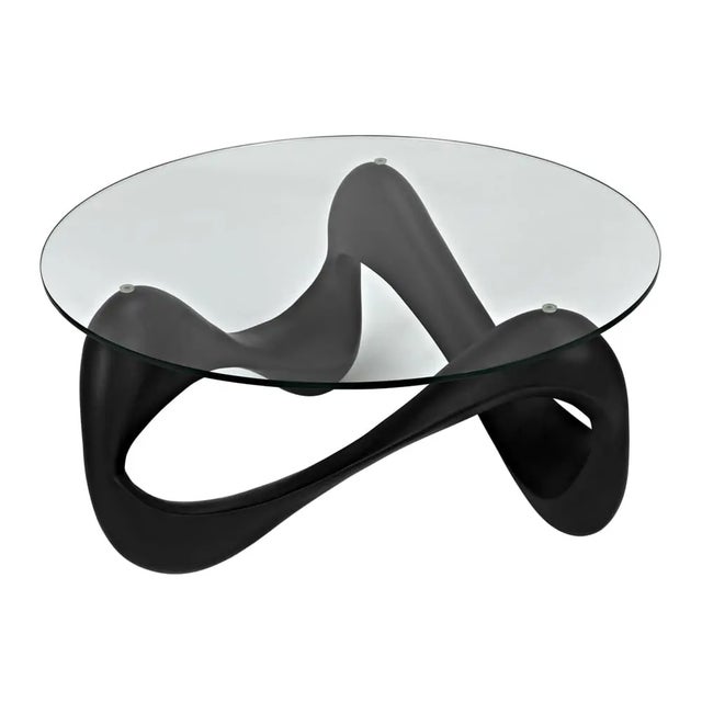 Inspired by the movement of the heavens, this solid yet somehow ethereal coffee table features a dynamic and undulating...