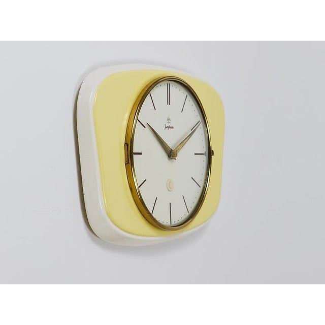 Yellow Pastel Yellow Midcentury Wall Clock in the style of Max Bill from Junghans, Germany, 1950s For Sale - Image 8 of 12