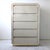 Pale peachy /blush / cream laminate waterfall drawers with gold plinth base, USA 1980s. Five drawers. Good vintage...