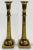 Pair of large vintage fluted brass candlesticks featuring solid square bases with almost floral embossed motif to stems....