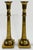 Pair of large vintage fluted brass candlesticks featuring solid square bases with almost floral embossed motif to stems....