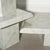 Waterfall edge faux Carrara marble laminate end tables. Wonderful vintage condition with some minor chips along edge....