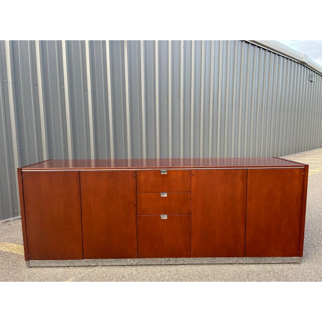 Vintage Sunar Credenza, made in Canada. This credenza sits on a chrome base and features chrome handles and front top...