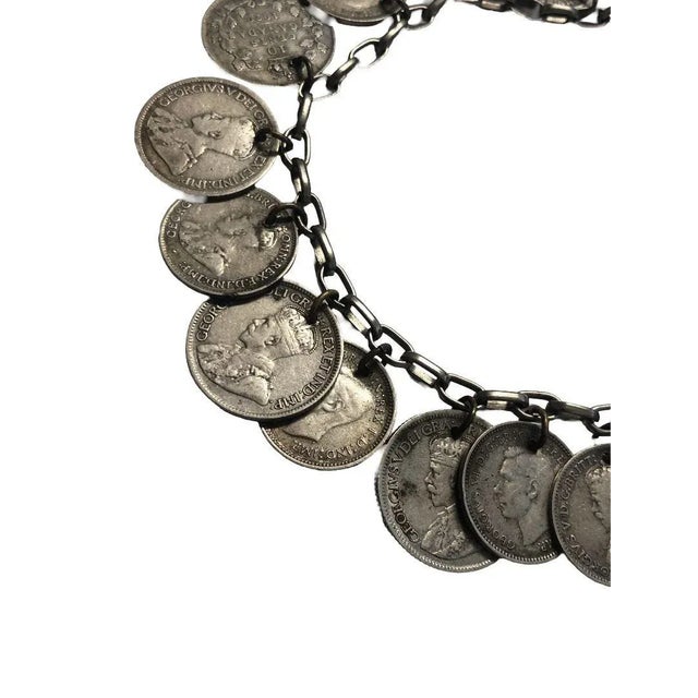 Handmade WWII era silver coin bracelet featuring 15 silver coins (3 pence to 10-cent coins) from Canada, Australia and...