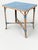 Woven rattan table, mid-20th century Side table/garden table in predominantly blue rattan, in a woven style. The tabletop...