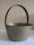 Description: Heavy brass pot Thick forged iron handle Handle attached by rivets Condition: Excellent Minor signs of age...