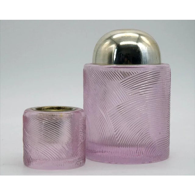 Sergio Asti smoking set in pink crystal produced by Arnolfo di Cambio in the 1970s. Composed of two pieces (cigarette...