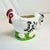 This is a whimsical little planter from the Mid-Century. The delightful Chicken is white with black tail feathers. She is...