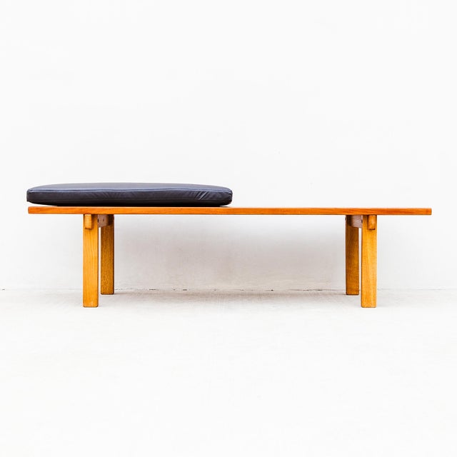 Vintage Danish mid century modern studio made teak and oak bench or low coffee table. Features a novel, frameless design...