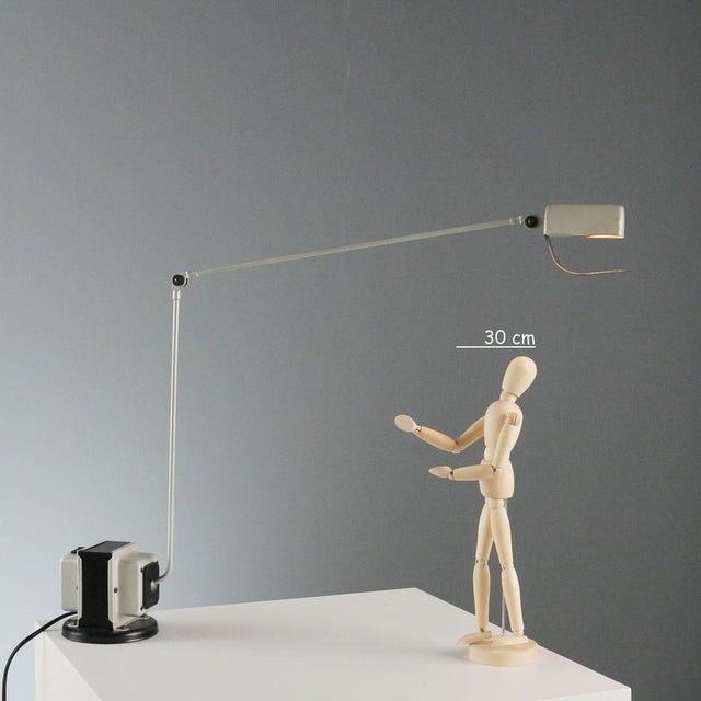 Table lamp model 'Daphine' designed by Tommaso Cimini for Lumina in the 1980s. Made of metal and plastic material, it...