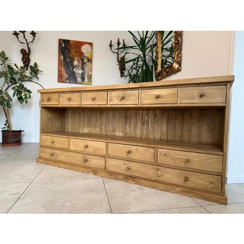 Charming sideboard/12-drawer chest made of solid wood/softwood/oak. Dimensions: Height x Width x Depth 88 x 201 x 42 cm....
