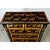 A vintage English pine chest recently updated with new paint of ebonized effect and pasted decoupage deer. The density of...