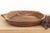 The sculptural form of this vintage bowl takes center stage. Carved from a single piece of solid hardwood, it features a...