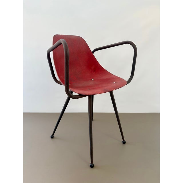 René-jean caillette "ladybug" armchair reinforced red fiberglass shell black lacquered tubular legs and armrests circa...